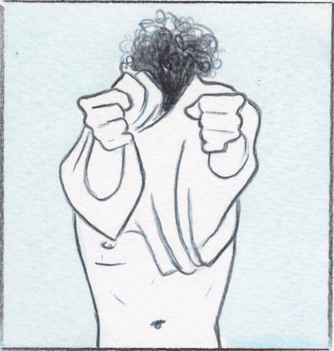 The shirt comes off over his head